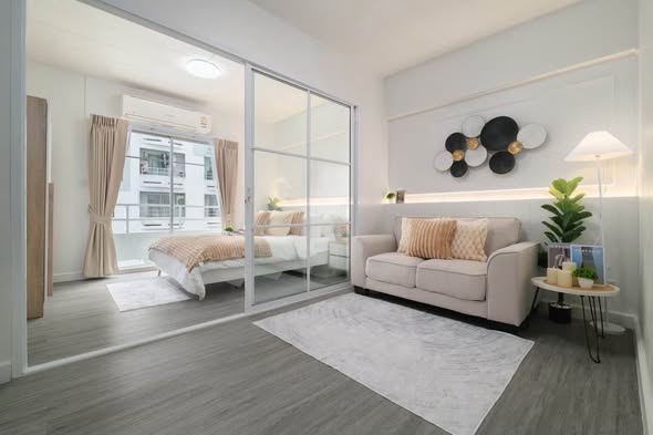 living room and bedroom of Studio One Condo