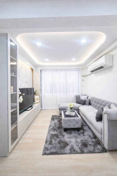 bedroom and living room of Suksrikarn Apartment