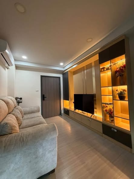 bedroom and living room of Supalai City Resort Sukhumvit 107
