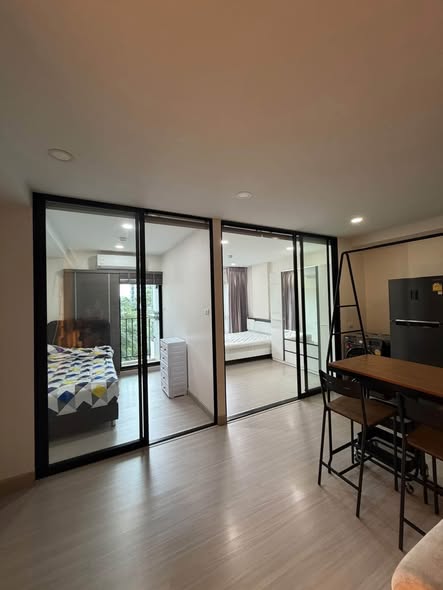 bedroom and room interior of Supalai City Resort Sukhumvit 107