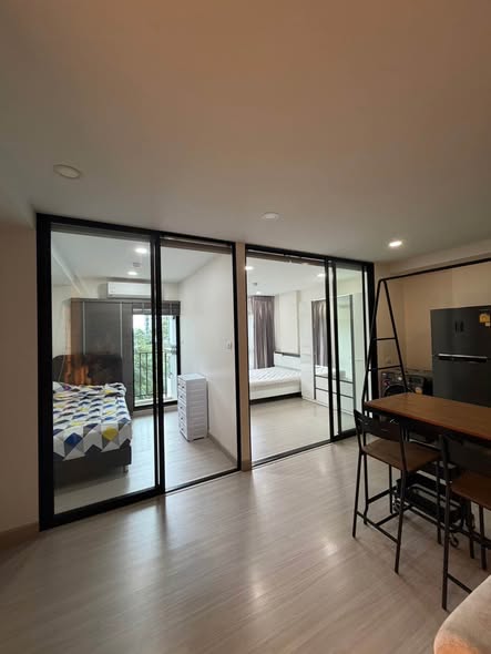 bedroom and room interior of Supalai City Resort Sukhumvit 107