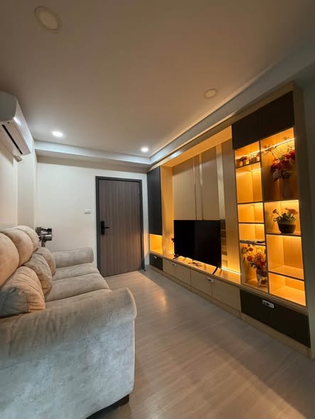 living room and bedroom of Supalai City Resort Sukhumvit 107