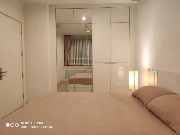 bedroom and room interior of TC-Green Condominium