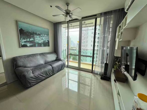 living room and bedroom of TC-Green Condominium