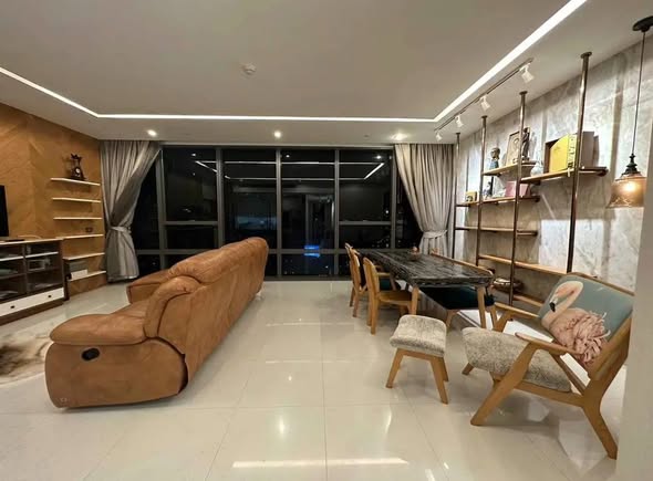 bedroom and living room of The Bangkok Sathorn