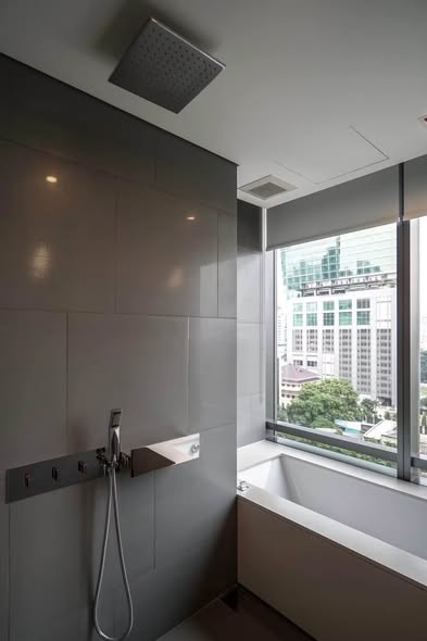 room interior and bathroom of The Bangkok Sathorn