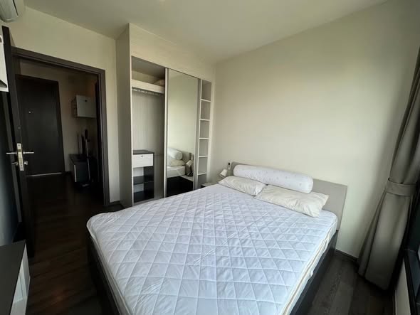 bedroom of THE BASE Park West – Sukhumvit 77