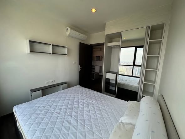 bedroom of THE BASE Park West – Sukhumvit 77