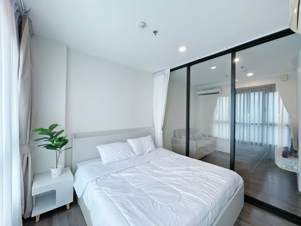 bedroom and room interior of THE BASE Park West – Sukhumvit 77