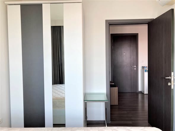 bedroom and room interior of THE BASE Park West – Sukhumvit 77