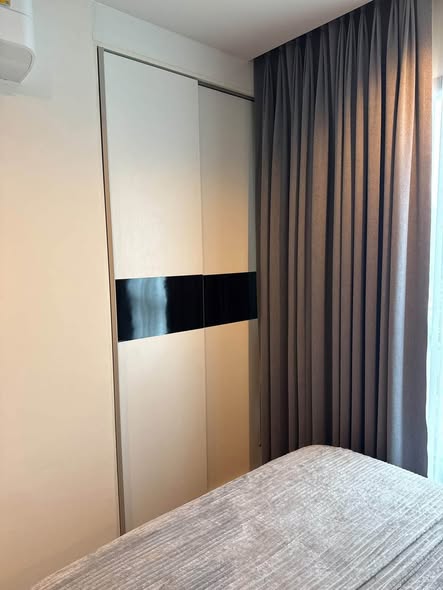 bedroom and room interior of THE BASE Park West – Sukhumvit 77