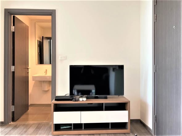 bedroom and room interior of THE BASE Park West – Sukhumvit 77