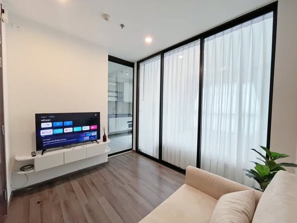 living room and room interior of THE BASE Park West – Sukhumvit 77