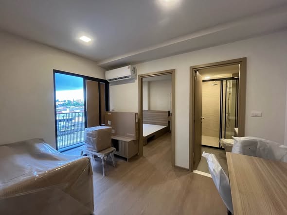 bedroom and room interior of The Base Ratchada 19