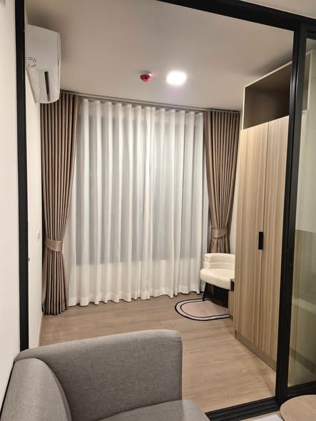 room interior and bathroom of The Base Ratchada 19