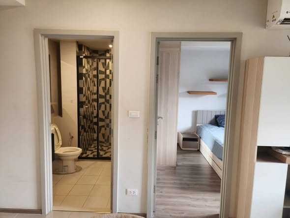 bedroom and room interior of THE BASE Sukhumvit 50