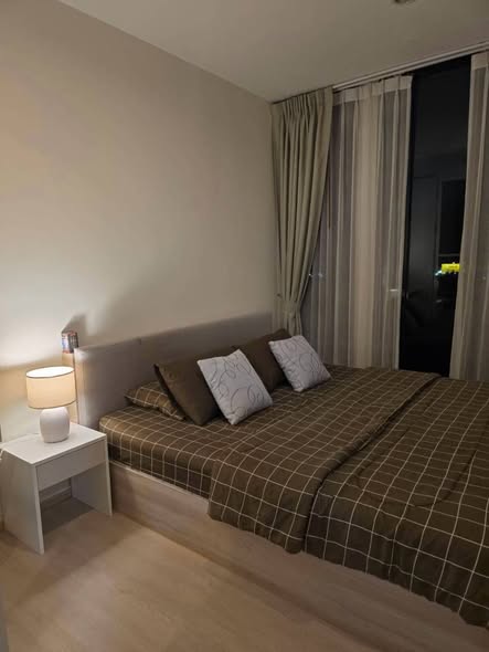 bedroom of The Base Uptown Condo