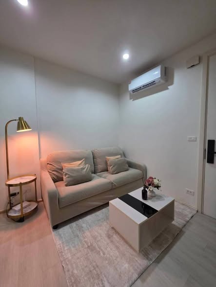 bedroom and living room of The Base Uptown Condo