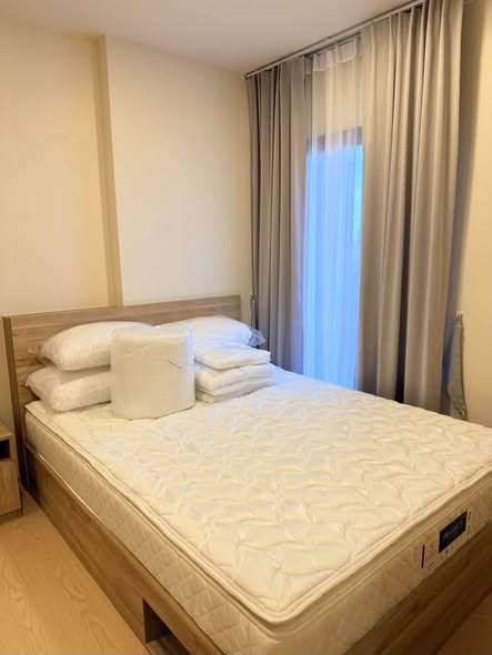 bedroom of The Base Urban Rama9