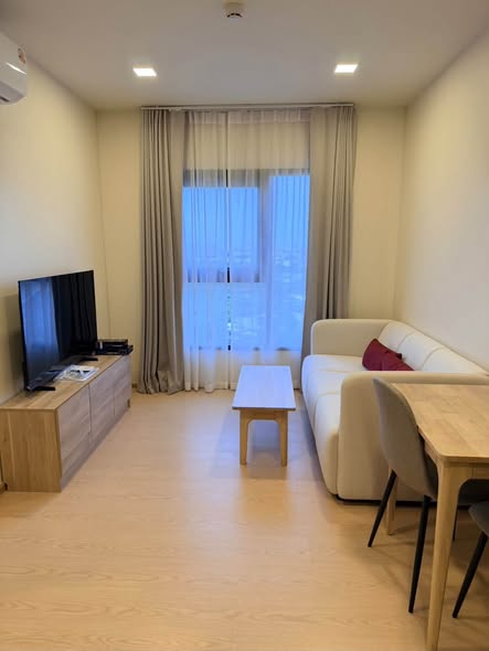 bedroom and living room of The Base Urban Rama9