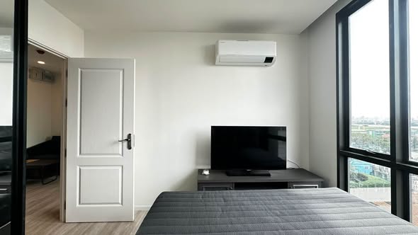 bedroom and room interior of The Clev Riverline Chaophraya – Wong Sawang