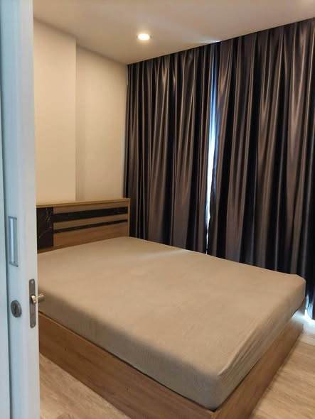 bedroom and room interior of The Clev Riverline Chaophraya – Wong Sawang