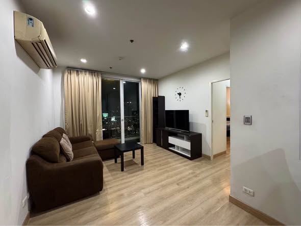 living room and bedroom of The Complete Narathiwas
