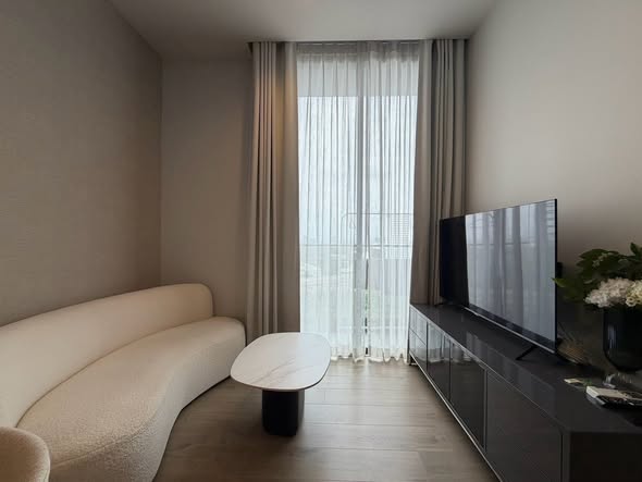 living room and bedroom of The Crest Park Residences