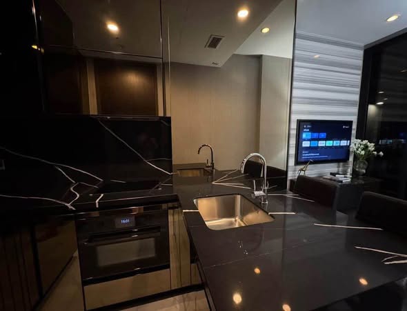 living room and kitchen of THE ESSE Sukhumvit 36
