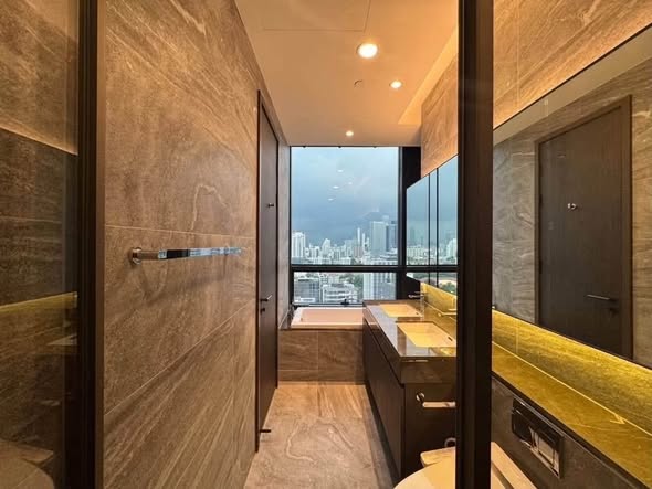 room interior and bathroom of THE ESSE Sukhumvit 36