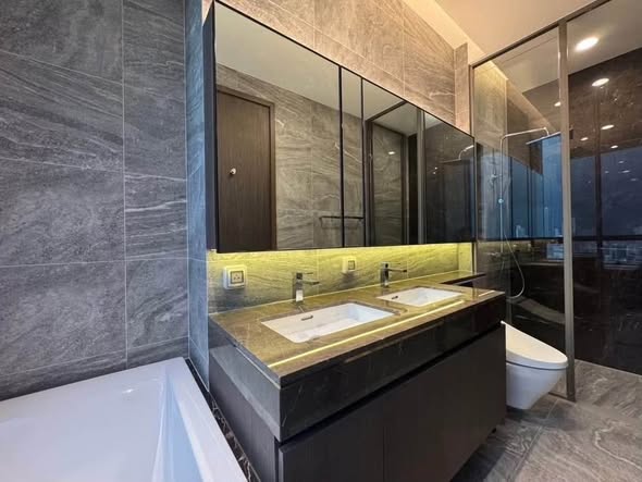 room interior and bathroom of THE ESSE Sukhumvit 36