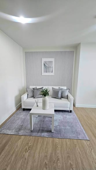 bedroom and living room of The Excel Groove