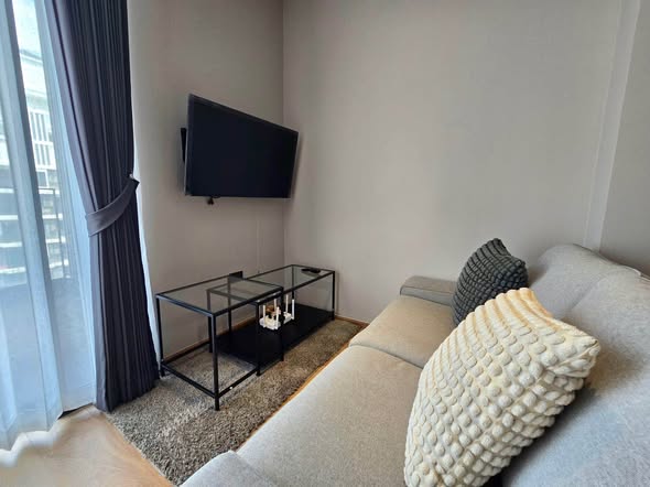 living room and bedroom of The Fine Bangkok