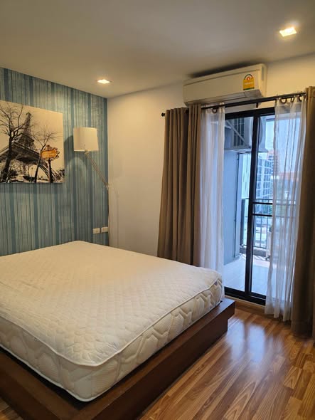 bedroom of The Green Condo III