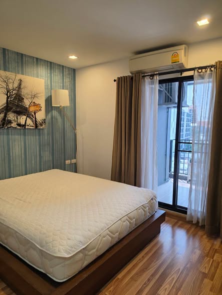 bedroom of The Green Condo III