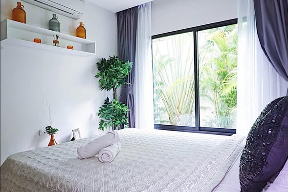 bedroom of The Happy Place Condominium