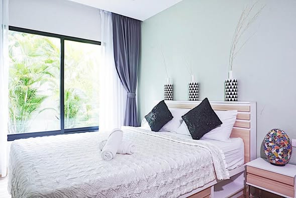 bedroom of The Happy Place Condominium