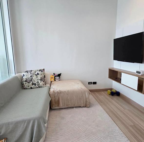 living room and bedroom of The Hotel Condominium