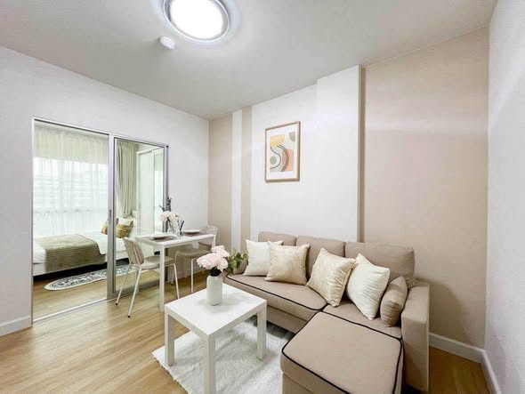 living room and bedroom of THE KITH CHAENGWATTANA