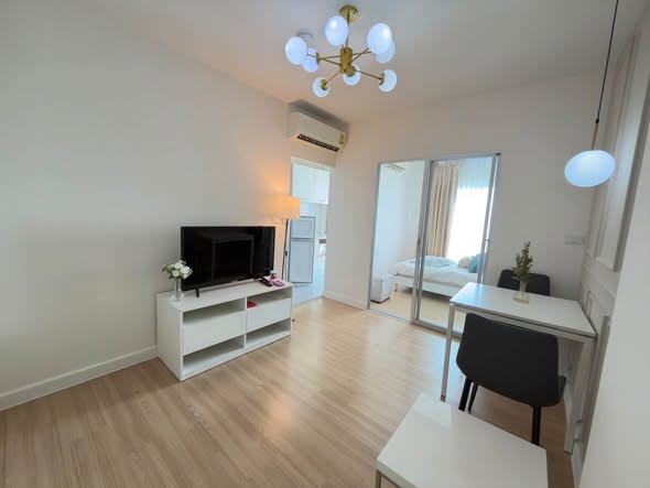 living room and bedroom of The Kith Plus Sukhumvit 113