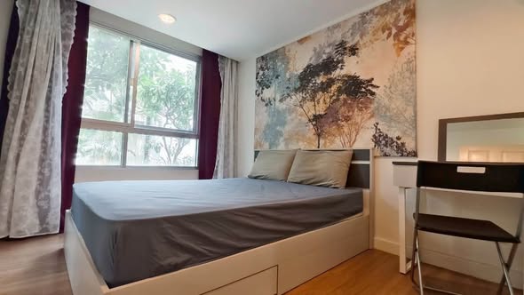 bedroom of The Kris 7