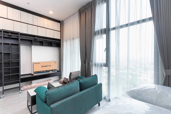living room and bedroom of THE LINE Sukhumvit 101