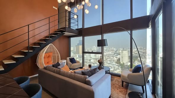living room of The Lofts Silom by Raimon Land