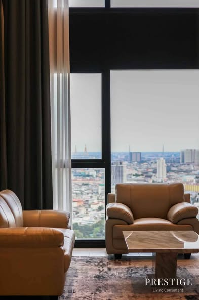 living room of The Lofts Silom by Raimon Land