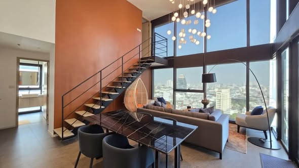 living room of The Lofts Silom by Raimon Land