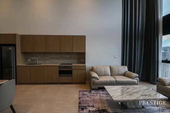 living room of The Lofts Silom by Raimon Land