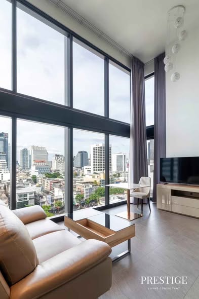 living room of The Lofts Silom by Raimon Land