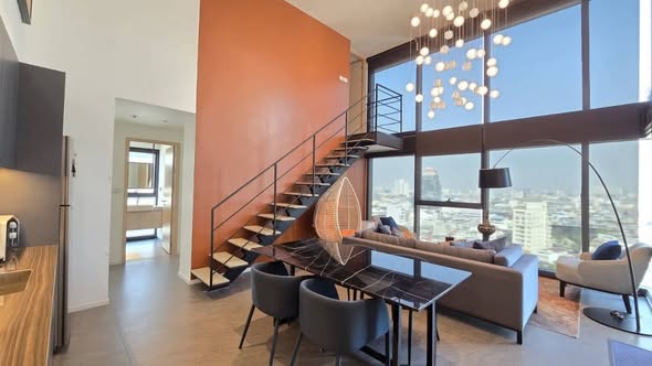living room of The Lofts Silom by Raimon Land
