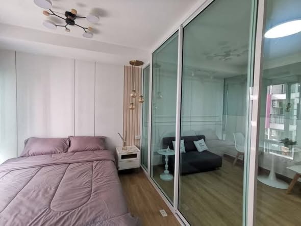 bedroom and room interior of The Log 3 Condominium