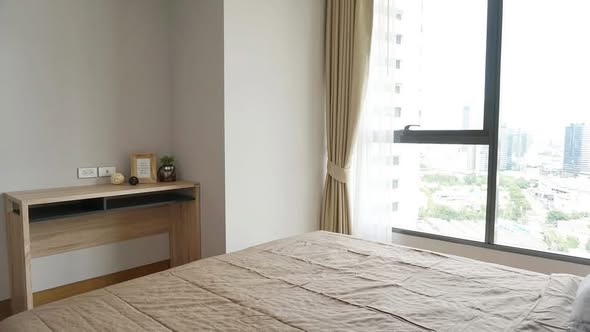 bedroom of The Lumpini 24